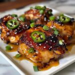 Sweet and Spicy Peach Jalapeño Glazed Chicken Thighs